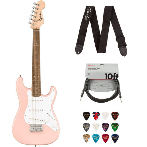 Squier Mini Stratocaster Electric Guitar- Shell Pink Bundle with Fender Professional Instrument Cable (10ft), Logo Guitar Strap and Classic Celluloid Guitar Picks 12-Pack